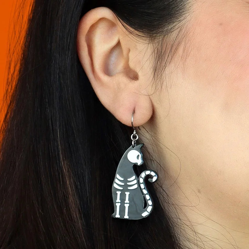 ERSTWILDER | EARRINGS | Bone Kitty Drop Earrings - Glow in the Dark