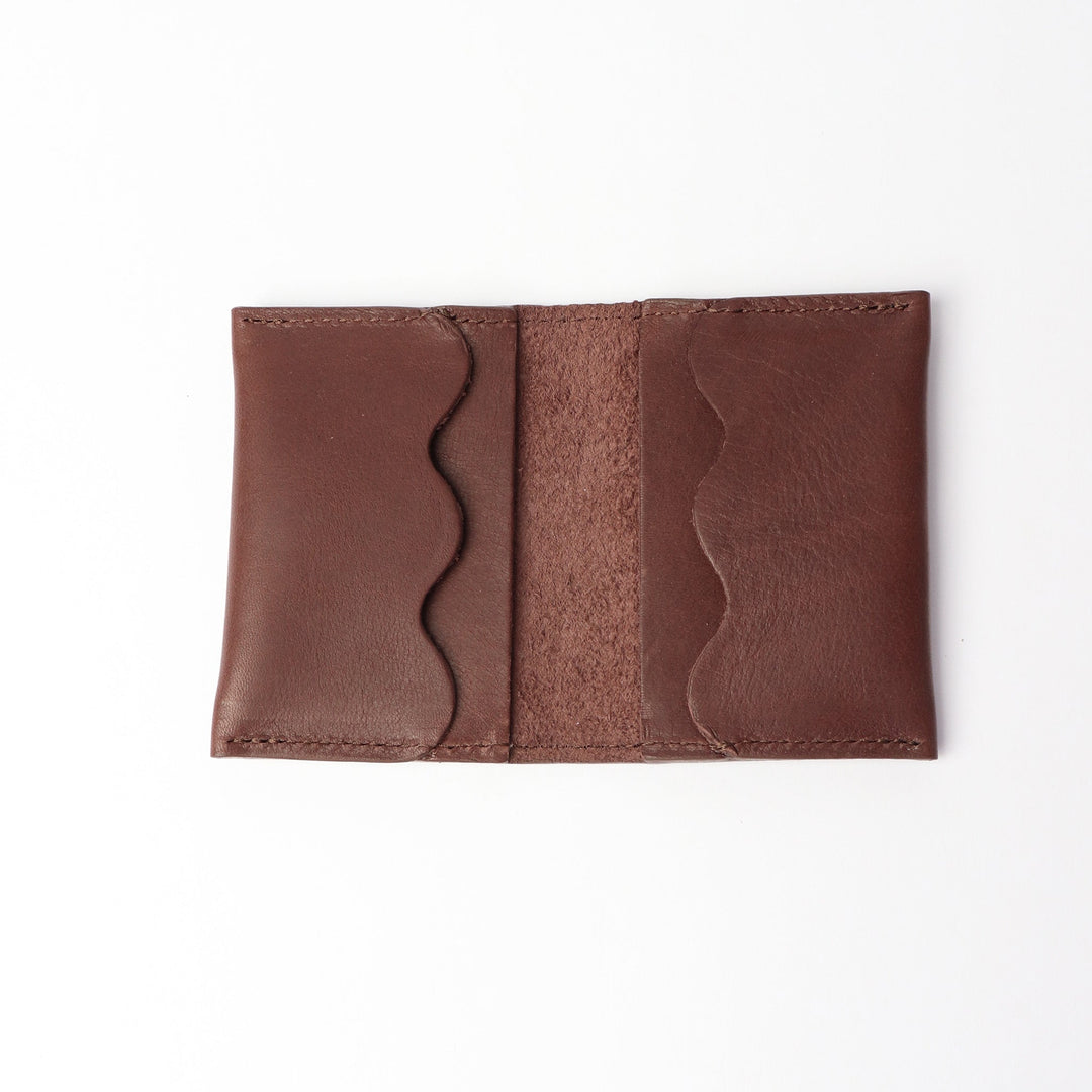 Project Dyad Wave Cardholder in Chocolate, open showing wave-edged card compartments