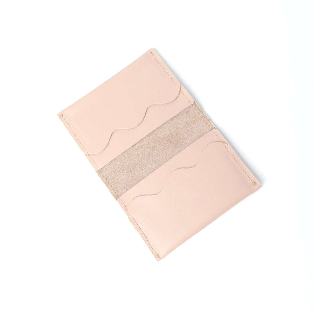 Project Dyad Wave Cardholder in Dusty Pink, open showing wave-edged card compartments