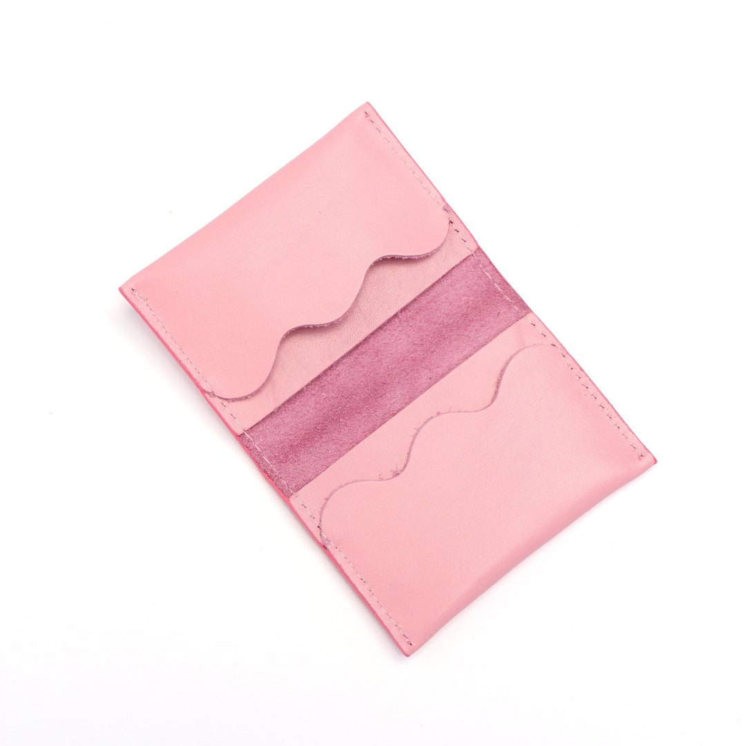 Project Dyad Wave Cardholder in Candy Pink, open showing wave-edged card compartments
