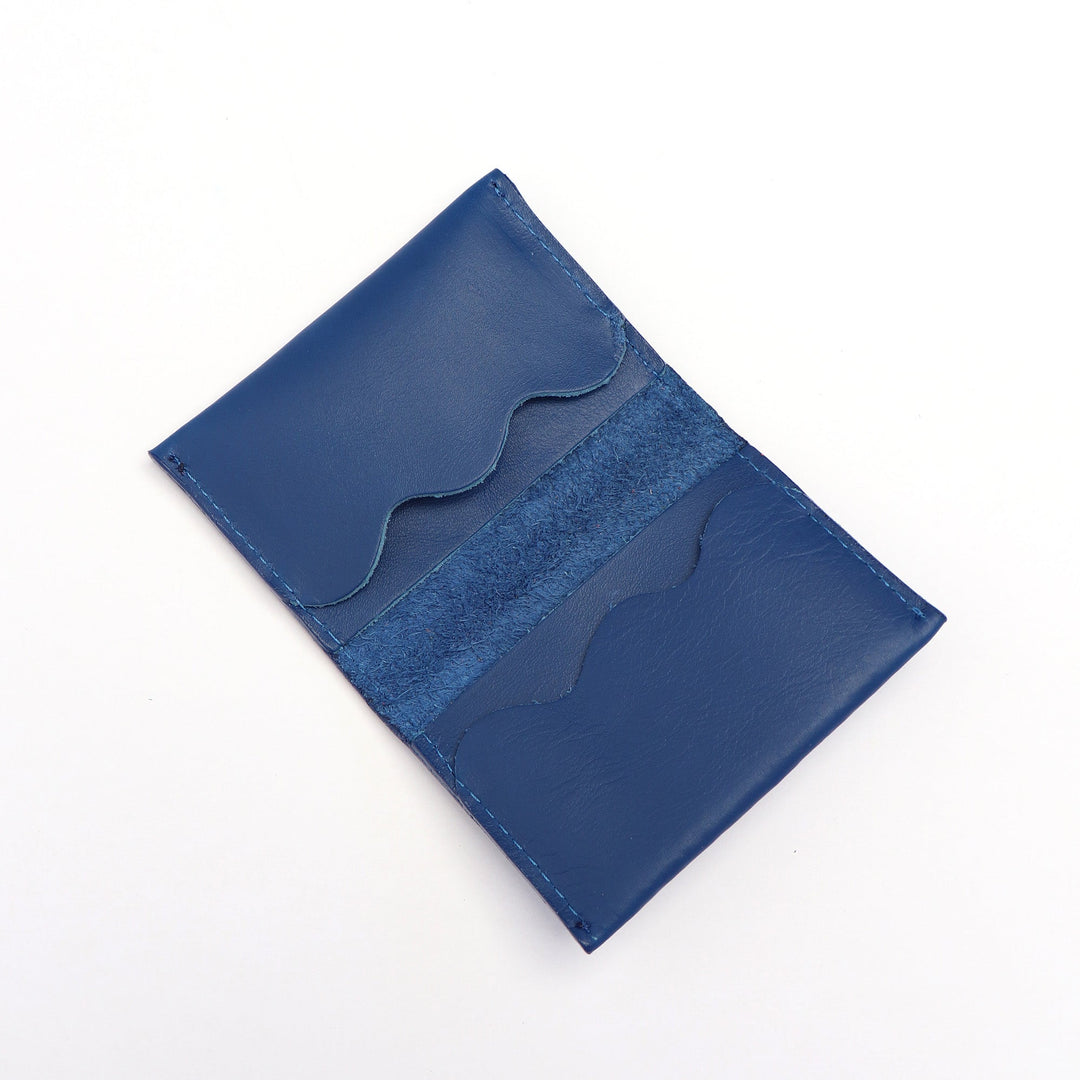 Project Dyad Wave Cardholder in Cobalt, open showing wave-edged card compartments