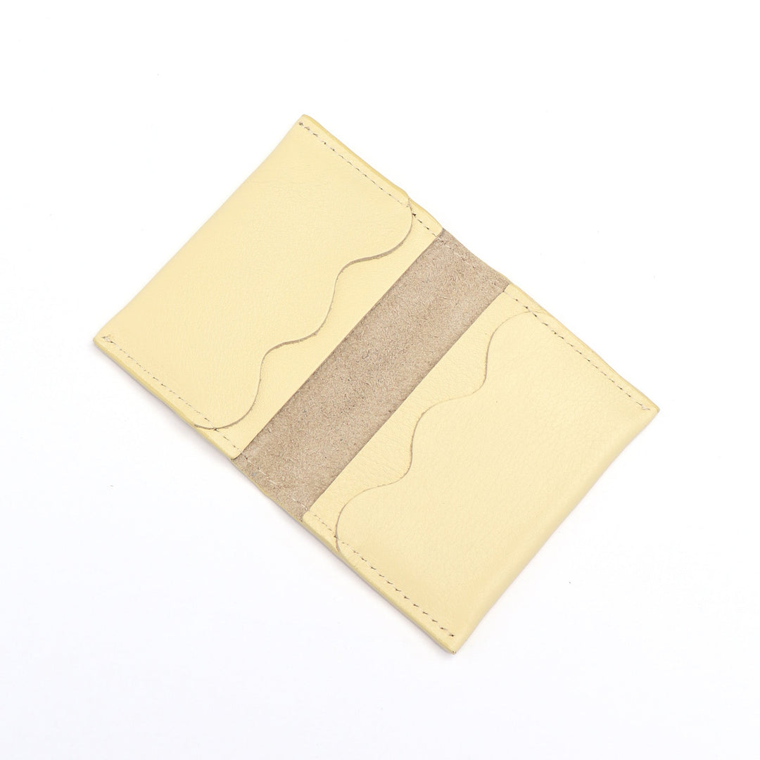 Project Dyad Wave Cardholder in Butter, open showing wave-edged card compartments