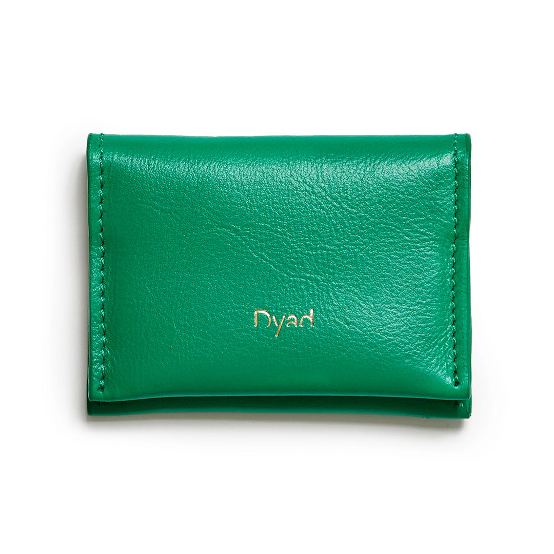 Project Dyad Wave Cardholder in Lawn Green, closed with gold Dyad logo