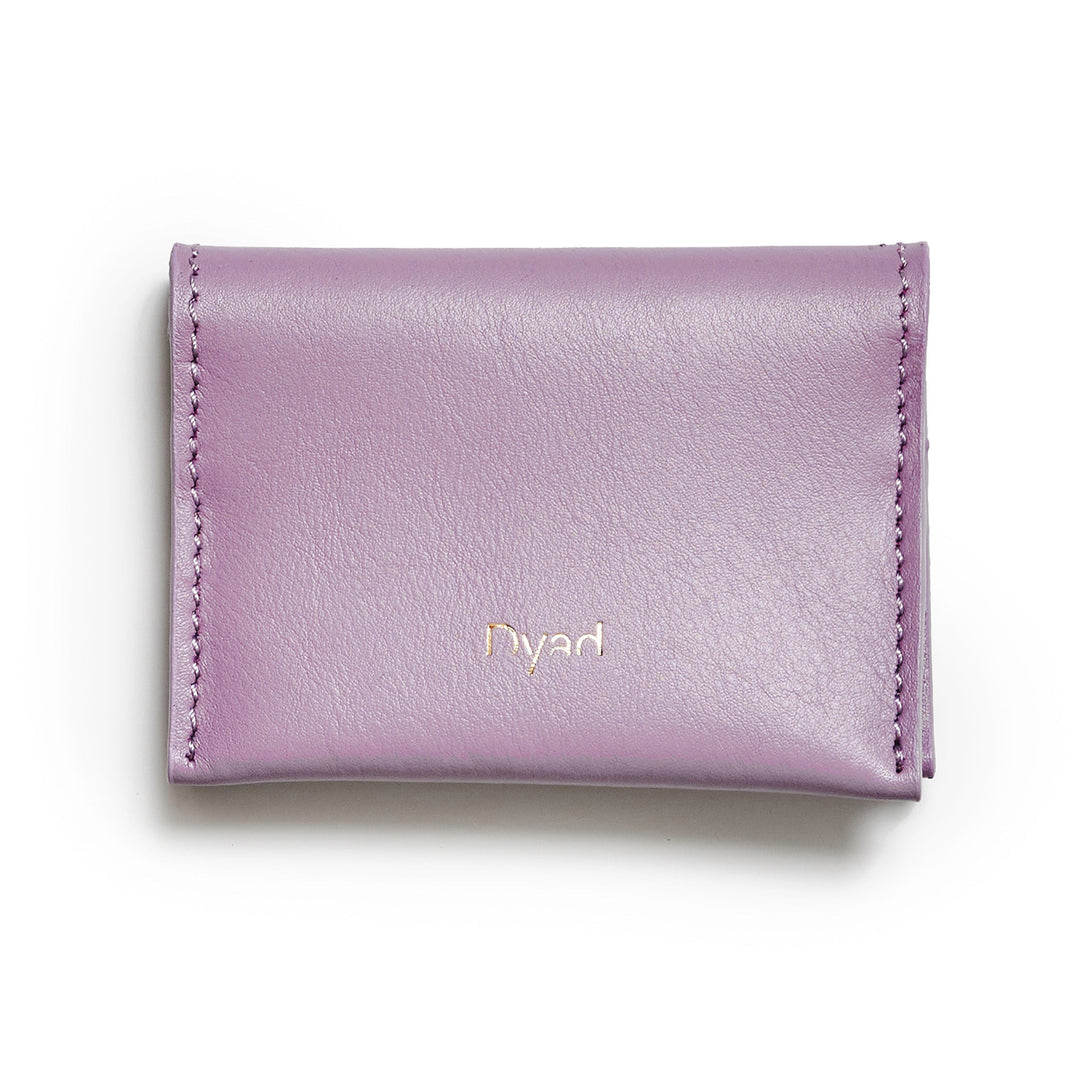 Project Dyad Wave Cardholder in Lilac, closed with gold Dyad logo