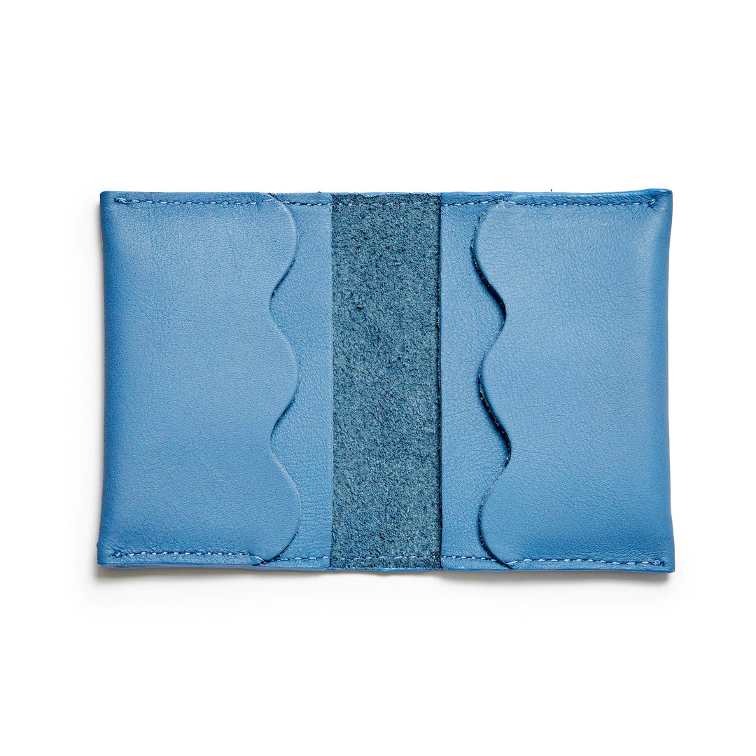 Project Dyad Wave Cardholder in Sky Blue, open showing wave-edged card compartments