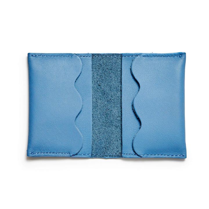 Project Dyad Wave Cardholder in Sky Blue, open showing wave-edged card compartments