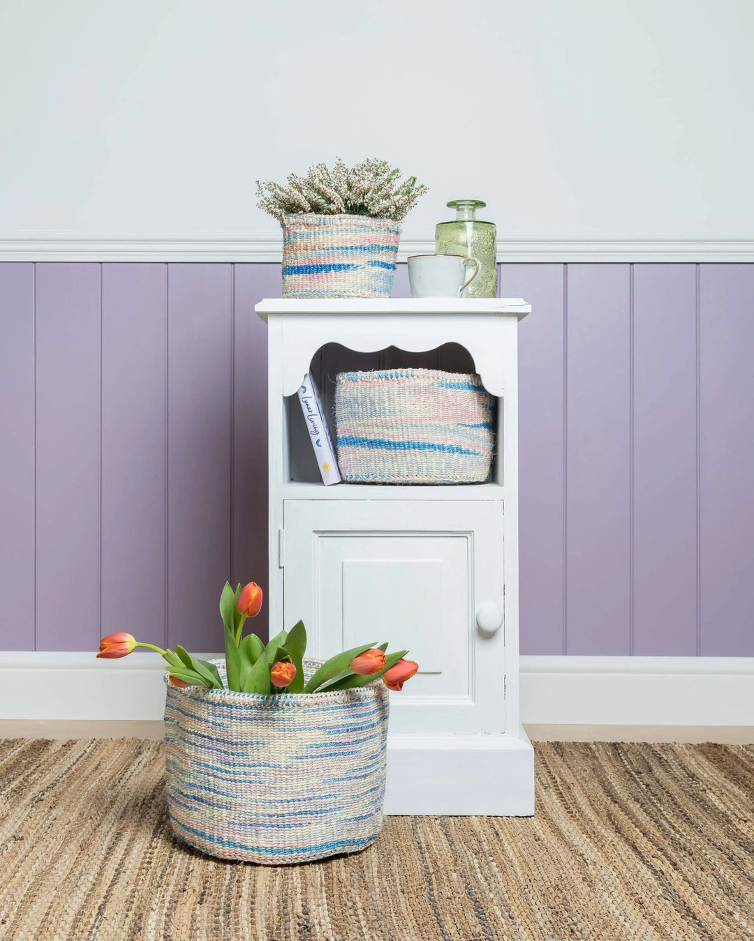 KWENYE by The Basket Room — basket size range styled around a bedside cabinet