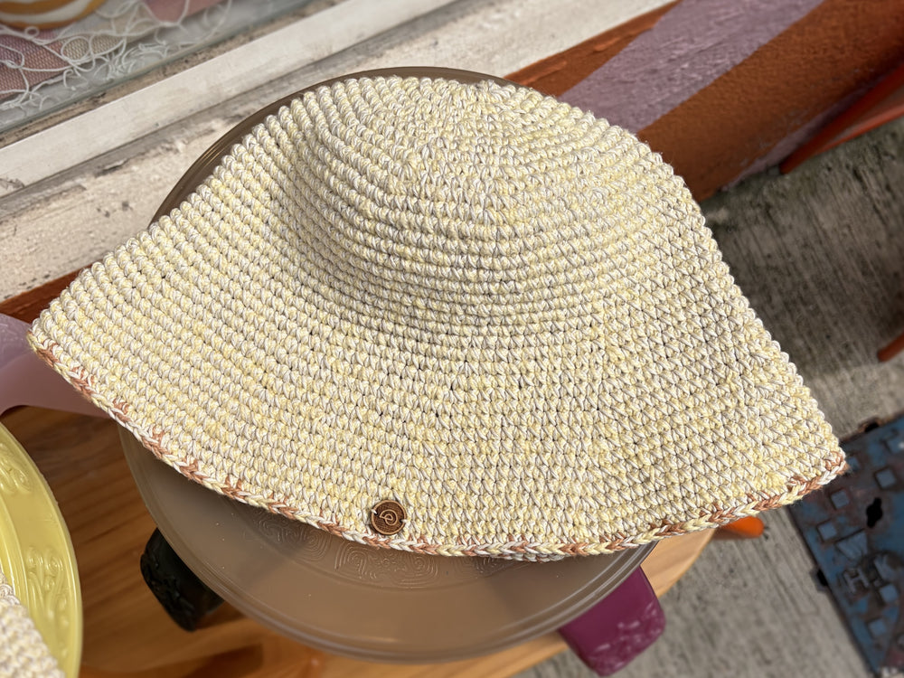 Earth Age x Goosebump exclusive Butter Yellow short-brim crochet hat, original photograph with natural background