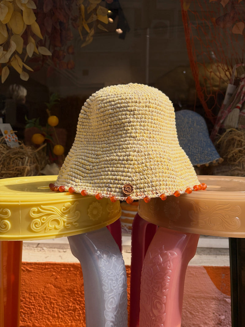 Butter Yellow crochet, orange checker brim and orange glass beads