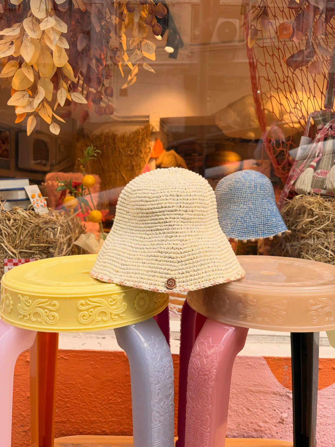 Earth Age × Goosebump Butter Yellow short-brim crochet hat with orange checker detail