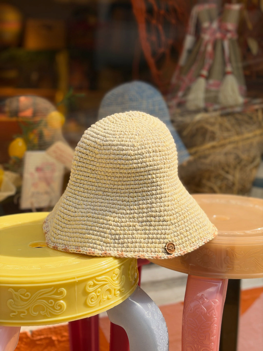 Earth Age x Goosebump Butter Yellow pink glass bead hat, original product photograph from the collaboration post