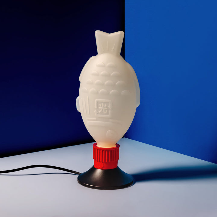 Light Soy Flex lamp with optional Universal Base; lamp and base sold separately