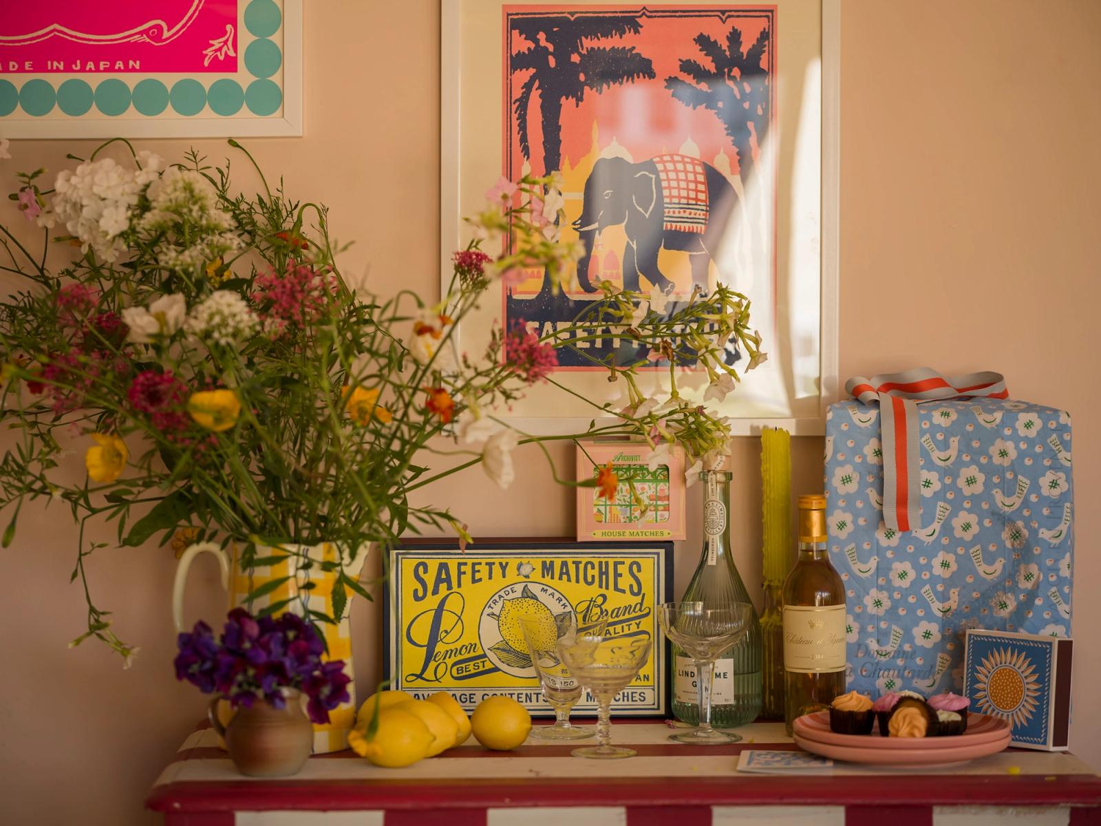 Archivist illustrations, a vase and a wine bottle in a colourful home corner