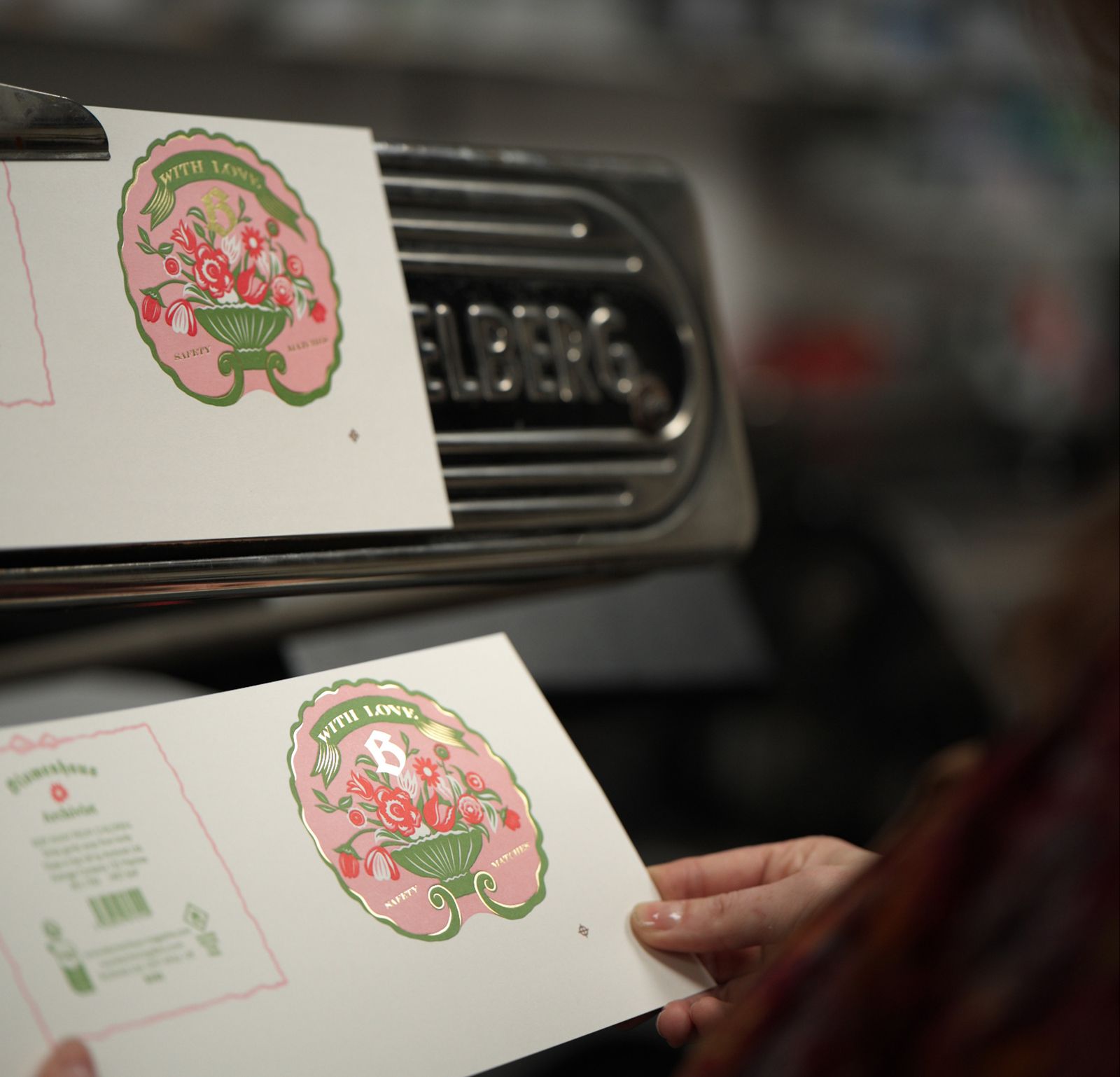 Freshly printed illustrated paper goods in the studio
