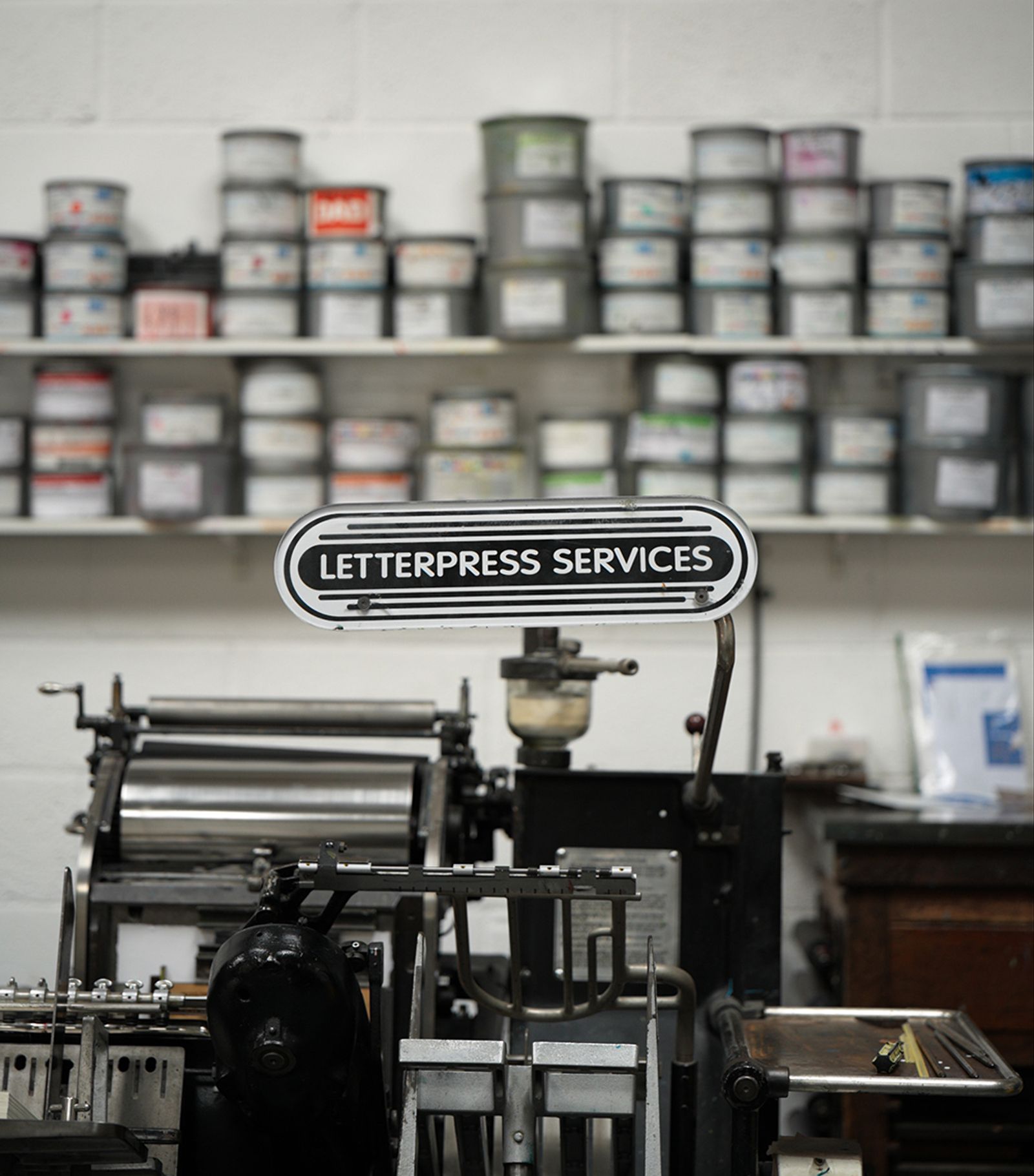 Archivist letterpress machine with ink tins