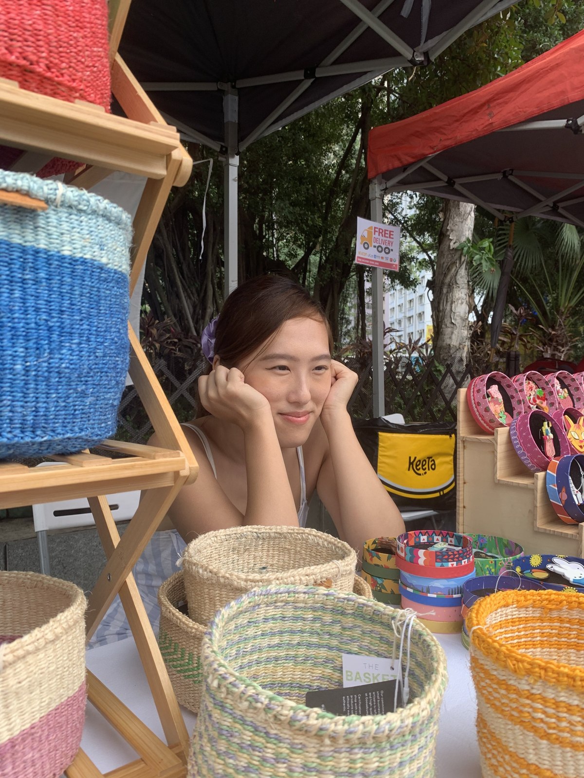 Original Goosebump market archive photograph with woven baskets and a participant